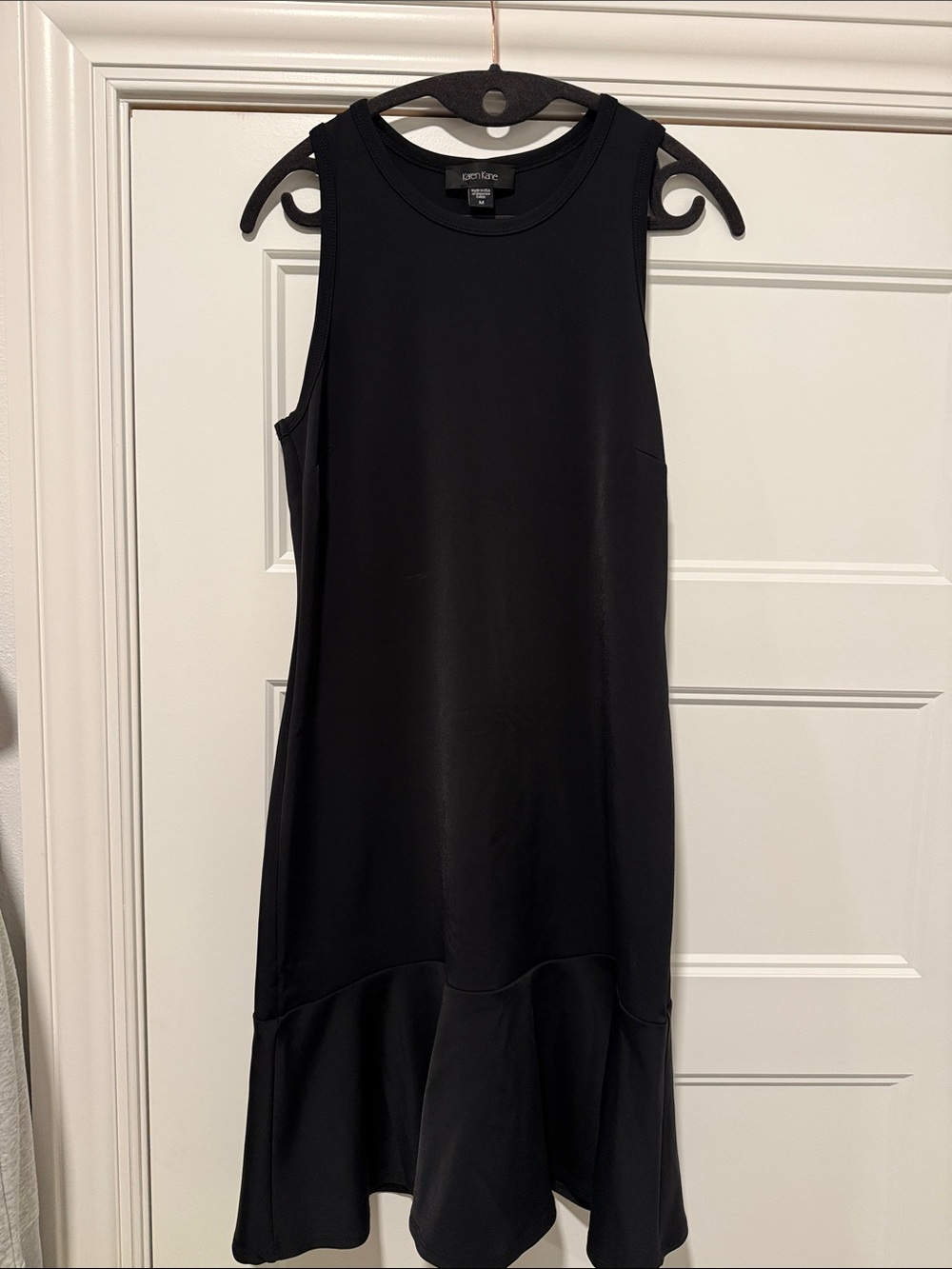 Karen Kane Black Sleeveless Crewneck Dress with Flounce Hem